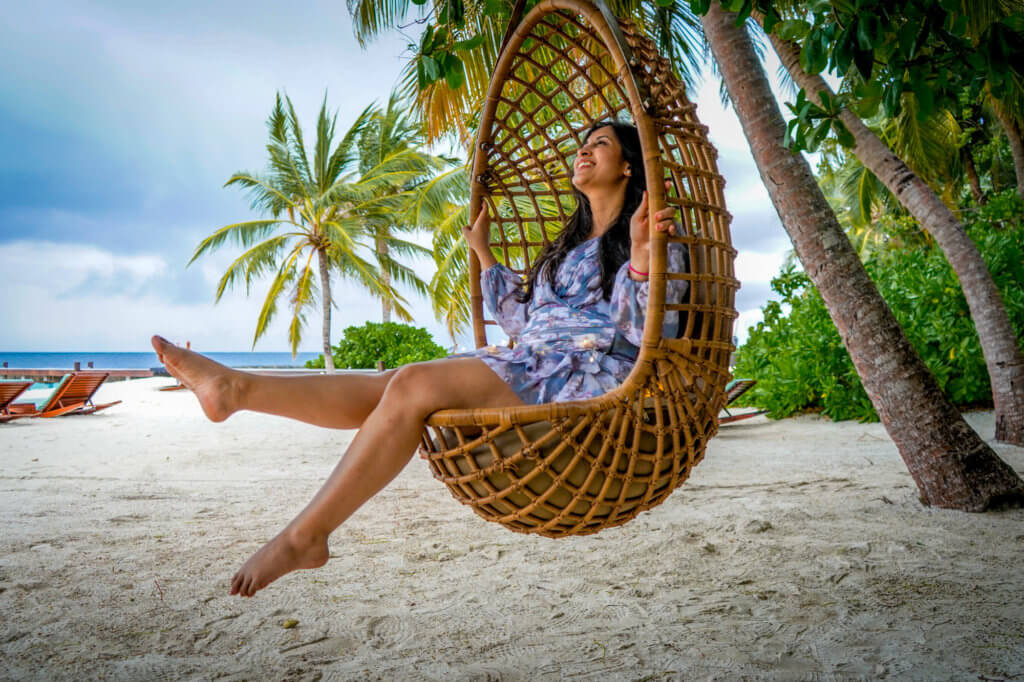 Have fun at a beach swing on a vacation to the Maldives