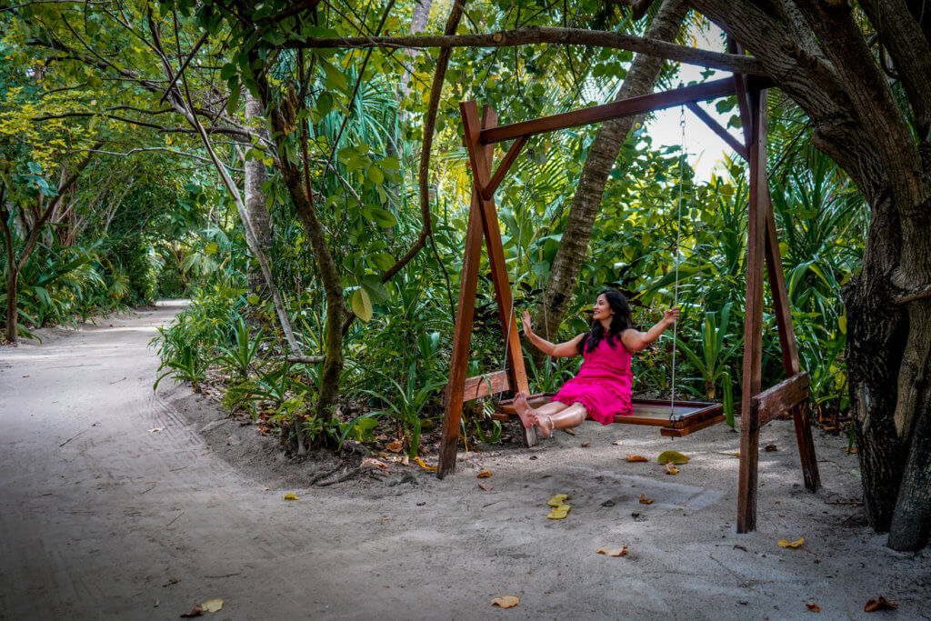 Swings within the Coco Bodu Hithi canopy