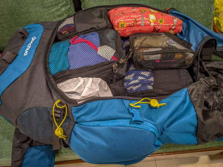 Rucksack packed with packing cubes- a must to travel smarter and better