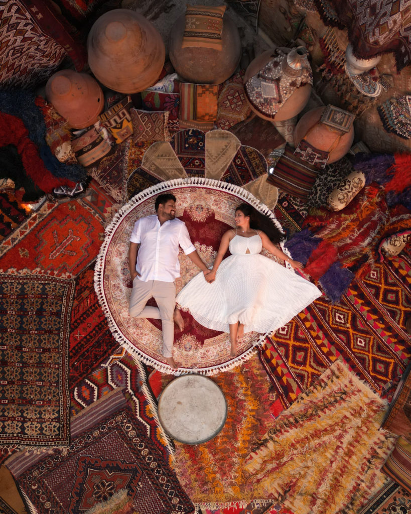 couple in white clothes on carpets