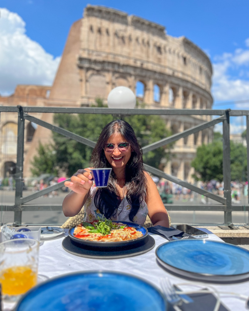 Having lunch with a view of the Colosseum at Royal Art Cafe in Rome