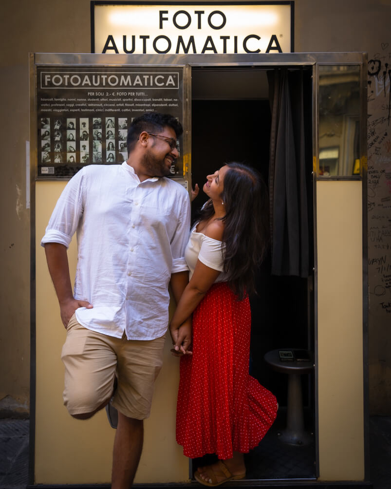 Trisha and Modi at a vintage photo booth in Florence