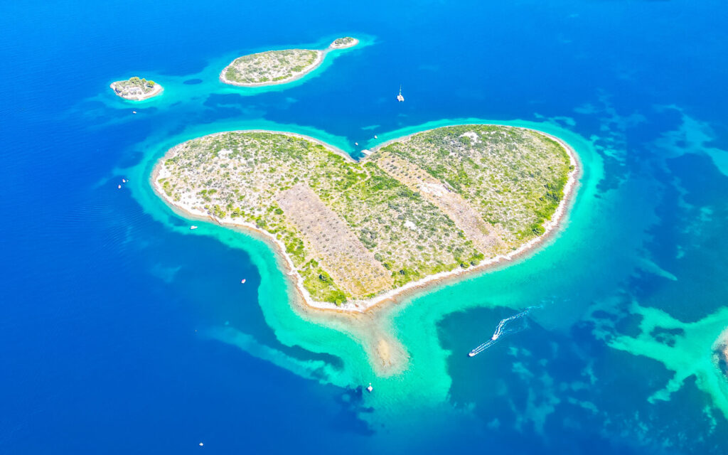A heart-shaped island surrounded by blue waters in Croatia