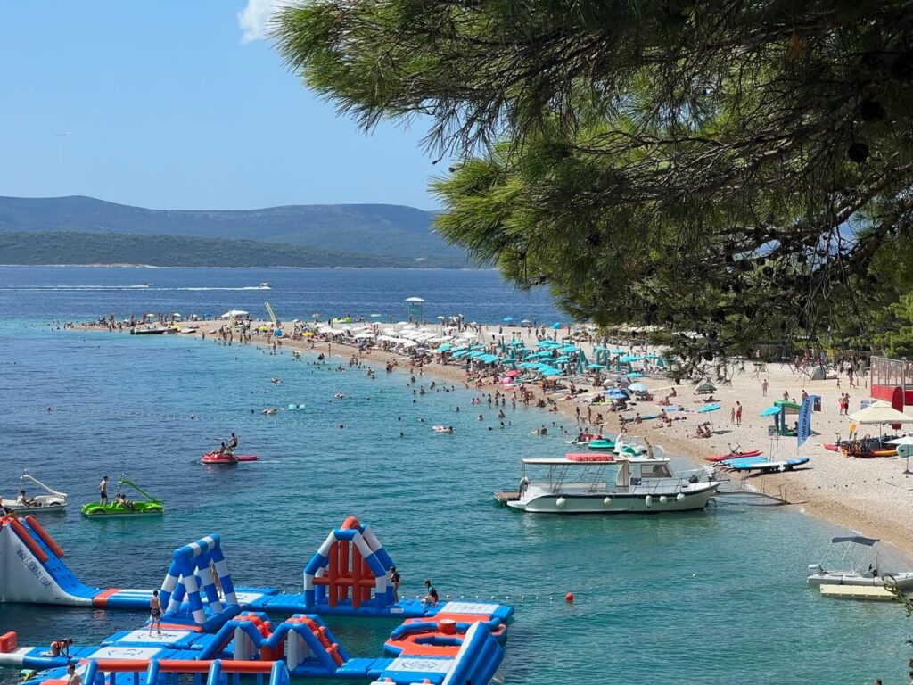 IMG_0263 Large Crowds at Golden Horn Beach in Croatia after 11 AM in the summer months