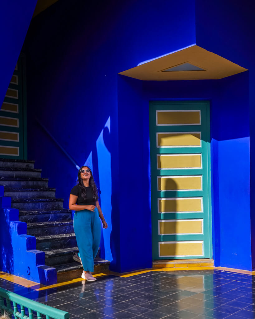 A girl posing at the electric blue villa in Majorelle Gardens