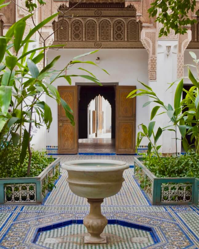 A view of the fountain in a garden at El Badi Palace