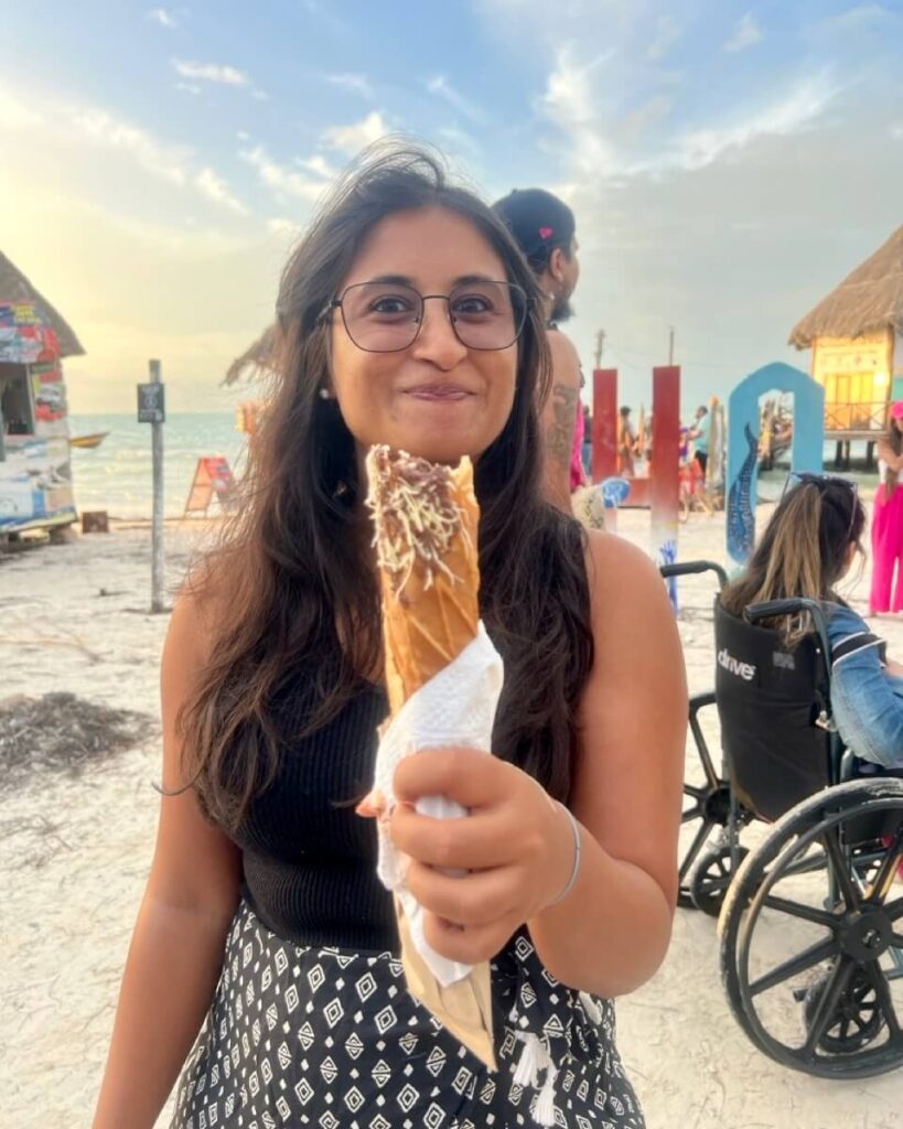Me trying a marquesita in Mexico