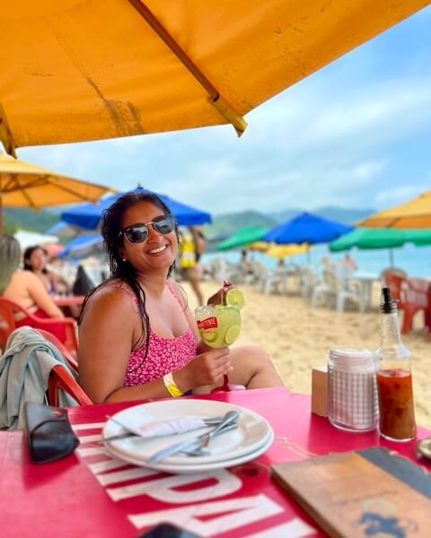 Drinking cocktails on a beach and enjoying the simple pleasures of life 