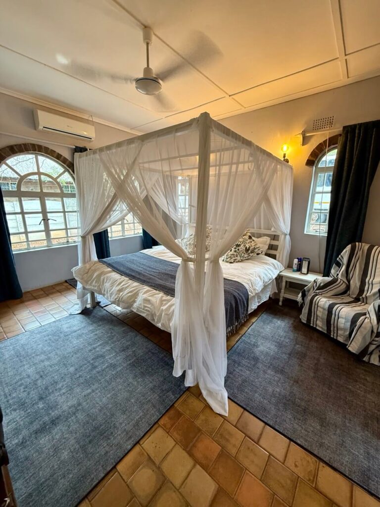 The Perfect 3 Days Victoria Falls Itinerary and Guide 6 The bedroom of our cosy Airbnb in Victoria Falls.