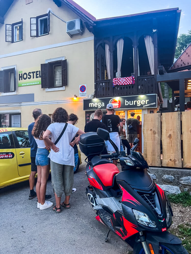 2-Day Lake Bled Itinerary: The Perfect Road Trip Guide 14 A queue of tourists outside Mega Burger
