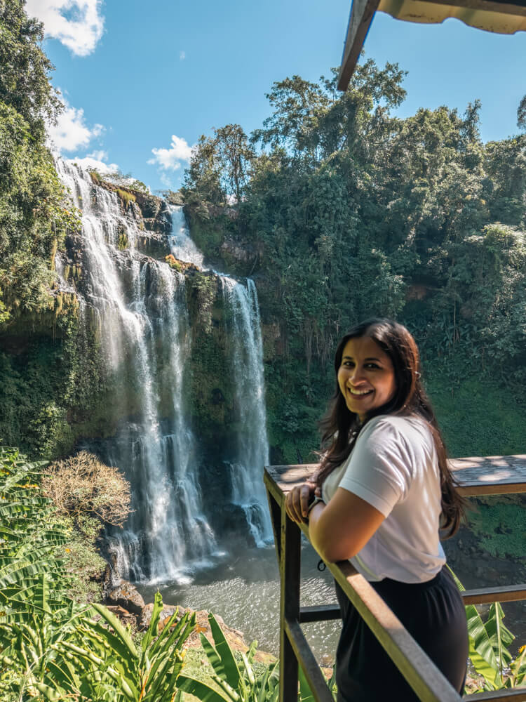 The Only Laos Itinerary You Need for 1 Week in Laos 28 A girl posing infant of Tad Gnueng waterfall