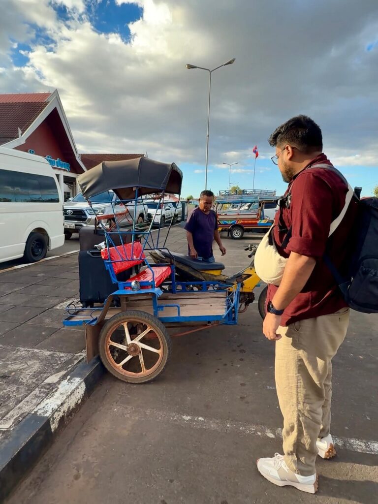Is Pakse Worth Visiting? 7 Reasons to Go & 3 to Skip It 19 Taking a rickshaw in Pakse from the airport to the hotel