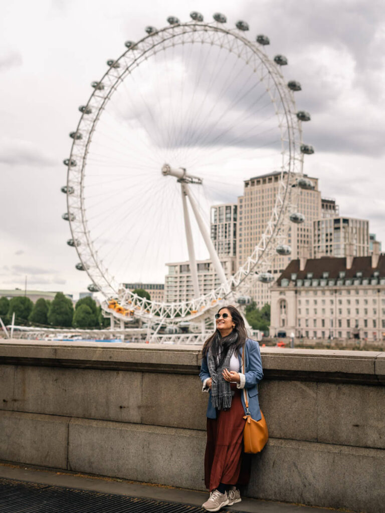 4-Day London Itinerary: Best of London + Easy Walking Routes 8 A girl posing in front of the London Eye
