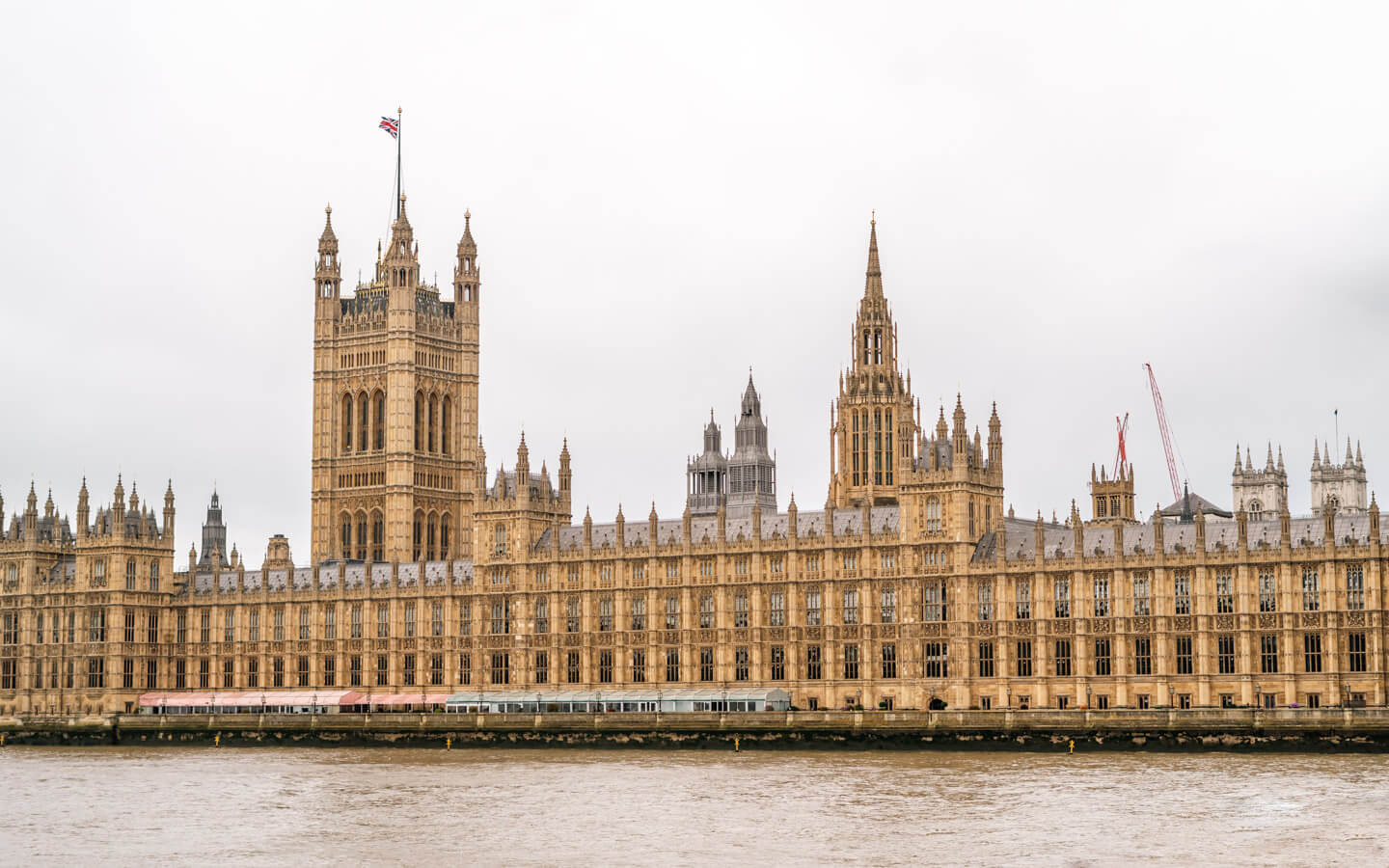Houses of Parliament and the Palace of Westminster along the River Thames in London.